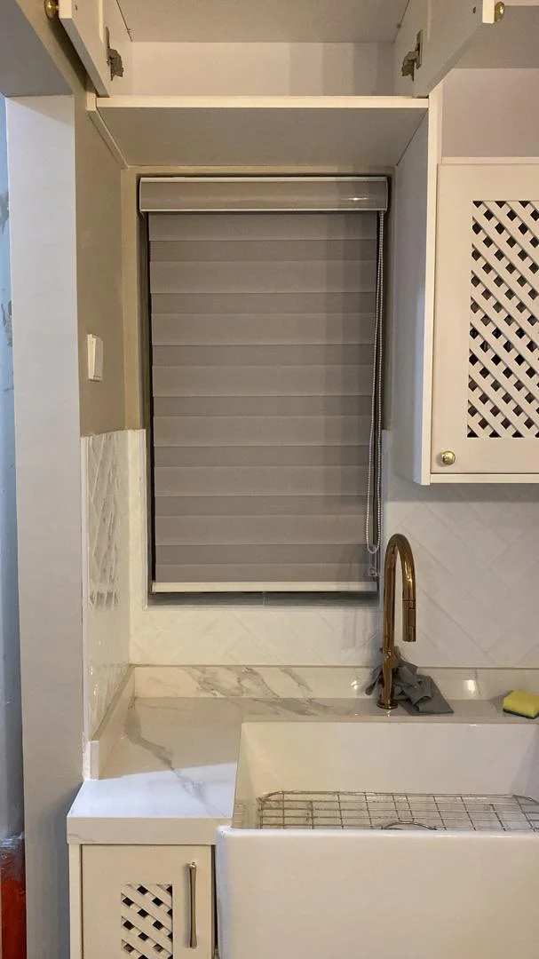 Grey zebra blinds in kitchen
